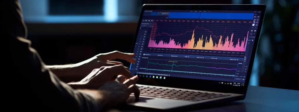 a person typing on a laptop with a graph showing the growth of an online store.