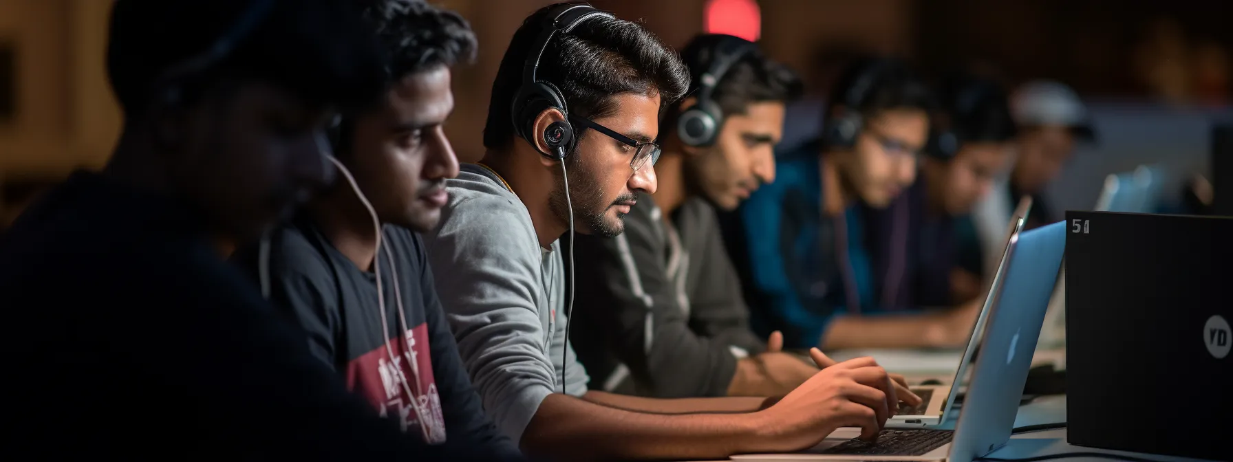 students engrossed in an online seo training course, absorbing knowledge from manick bhan's expert guidance.